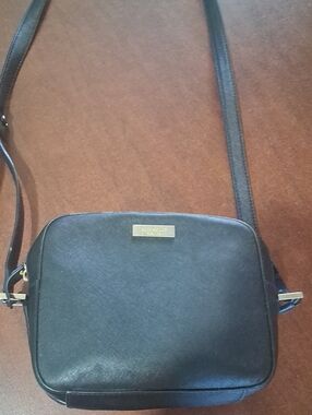 kate spade black crossbody with gold-tone logo plaque